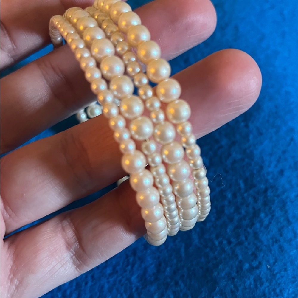 Vintage 1980s multi size quad row faux ivory pearl wrap around cuff bracelet EUC